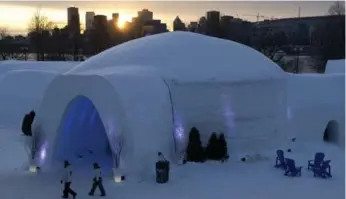  ?? PAUL CHIASSON/THE CANADIAN PRESS ?? It might not be the best year for it from a weather standpoint, but Montreal’s snow village is proving a big hit with locals and tourists alike. There’s an ice hotel and even an ice chapel. Just hope you don’t get cold feet.