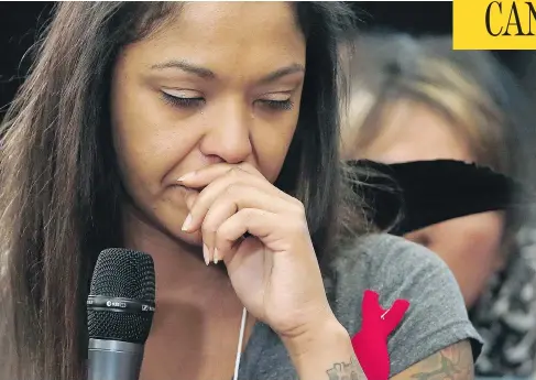  ?? JOHN WOODS / THE CANADIAN PRESS ?? Isabel Daniels weeps as she speaks of her murdered cousin Nicole Daniels at the missing Indigenous women inquiry in Winnipeg on Monday.