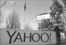  ?? THE ASSOCIATED PRESS FILE PHOTO ?? Verizon is going ahead with its acquisitio­n of Yahoo.