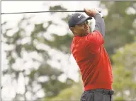  ?? Carolyn Kaster / Associated Press ?? Tiger Woods watches his tee shot on the second hole during the final round of the U.S. Open on June 16 in Pebble Beach, Calif.