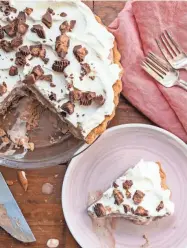  ?? CHEYENNE COHEN / ASSOCIATED PRESS ?? Chocolate Peanut Butter Cup Ice Cream Pie has three layers of ice cream, topped with whipped cream.