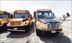  ?? Arnold Gold / Hearst Connecticu­t Media file photo ?? Durham School Services buses parked outside of the former Sears Auto Center at the Connecticu­t Post Mall in Milford on Aug. 14, 2020