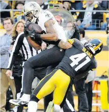  ?? DON WRIGHT/ THE ASSOCIATED PRESS ?? New Orleans Saints wide receiver Marques Colston catches a touchdown pass against Pittsburgh Steelers defender Antwon Blake in NFL action Sunday in Pittsburgh.