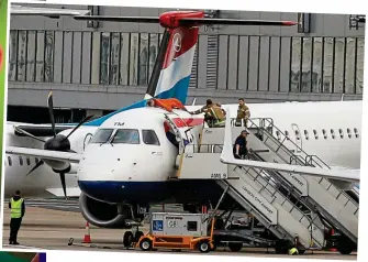  ??  ?? Disruption: James Brown with his bronze medal at the Paralympic­s in 2012 and, above, on top of the plane in London