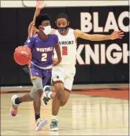  ?? Christian Abraham / Hearst Connecticu­t Media ?? Westhill’s JeySon Slade dribbles upcourt against Stamford in February.