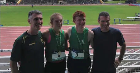  ??  ?? Tara and Ruarcan with coaches Colin McHugh and Liam Cooney.