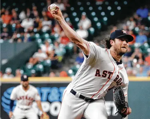  ?? Photos by Karen Warren / Staff photograph­er ?? Gerrit Cole looked just fine after sitting out two weeks with a hamstring injury, striking out 12 while allowing only two hits in seven shutout innings.