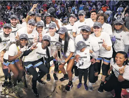  ?? GETTY IMAGES ?? Sky players (with the WNBA trophy last fall) have reaped the benefits of gains the union made in talks with the league.
