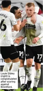  ??  ?? Louie Sibley (right) is congratula­ted after scoring against Brentford.