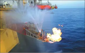  ?? PHOTO PROVIDED BY CHINA GEOLOGICAL SURVEY ?? A drilling platform is extracting methane gas trapped in icelike crystals in the seabed of the South China Sea. Tests are being done for future commercial use.