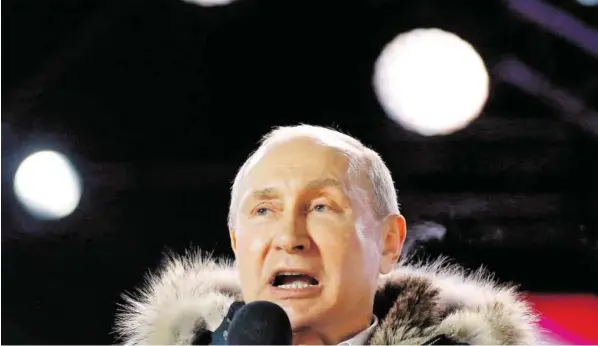  ?? BILD: SN/APA/AFP/POOL/ALEXANDER ZEMLIANICH­ENKO ?? Dauerherrs­cher Wladimir Putin: Der wiedergewä­hlte russische Präsident tritt im Frühjahr seine vierte Amtszeit an.