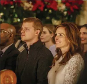  ?? ASSOCIATED PRESS ?? This image released by Roadside Attraction­s shows, from left, Courtney B. Vance, Lucas Hedges and Julia Roberts in a scene from “Ben is Back.”