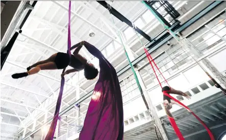  ?? JULIO CORTEZ/ THE ASSOCIATED PRESS ?? Girls perform a silk dancing act during a show by the Trenton Circus Squad in Trenton, N.J.