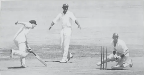  ?? ?? Doug Ring is run out for 67 in the second innings in the Third Test at Adelaide. S Guillen is the wicketkeep­er, F Worrell is the fieldsman. (Source: With the West Indies in Australia 1951-52/J Moyes)