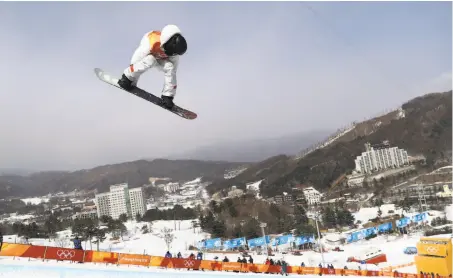  ?? Clive Rose / ?? Shaun White of the U.S. competes in the snowboard halfpipe qualifier at Phoenix Snow Park in Pyeongchan­g, South Korea.