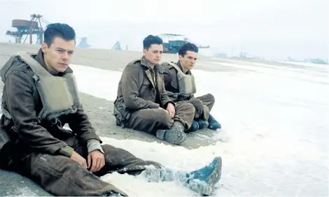  ?? SUPPLIED PHOTO/WARNER BROS PICTURES ?? This image released by Warner Bros. Pictures shows Harry Styles, from left, Aneurin Barnard and Fionn Whitehead in a scene from Dunkirk. Styles, 23, who gained fame with One Direction and recently launched his solo career, plays a British soldier in...