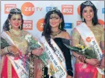  ??  ?? Winner Kiara Rampaul, centre, is flanked by first princess Dheruska
Budram, left, and second princess Keshenaa Fakir.
