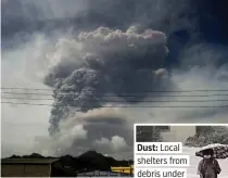  ?? REUTERS AFP/UWI ?? Plume: Volcano erupts
Dust: Local shelters from debris under brolly