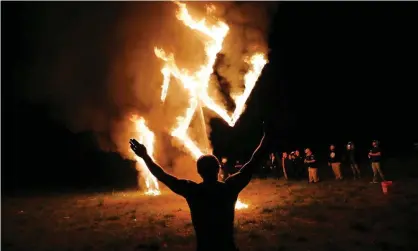  ??  ?? ‘Are you nazi that makes videos about the superiorit­y of the white race? That is NOT grounds for removal,’ wrote Julian Chandra, a vicepresid­ent of the company that owns Odysee. Photograph: Spencer Platt/Getty Images