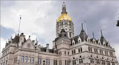  ?? Hearst Connecticu­t Media file photo ?? The Connecticu­t State Capitol building in Hartford. Eligible families for the tax credit must apply with the Department of Revenue Services between June 1 and July 31 to receive the rebate of $250 per child for a maximum of three children.