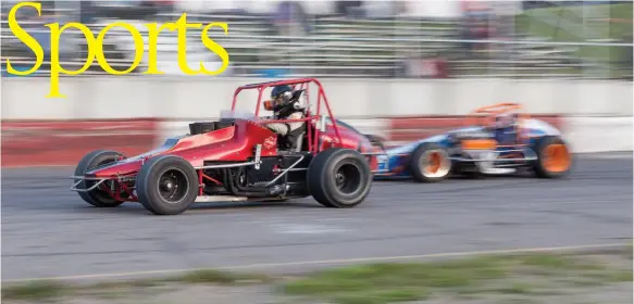  ?? CITIZEN PHOTO BY JAMES DOYLE ?? Ryley Seibert of Whitecourt leads the pack around the track at PGARA Motor Speedway on Wednesday during West Coast Vintage Racing Associatio­n sprint car action.