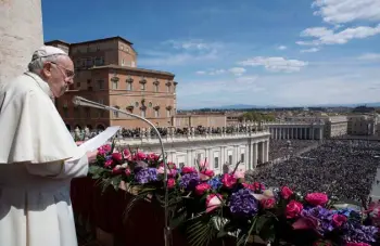  ?? Provided by Vatican Media/afp via Getty Images ?? Pope Francis delivers the Easter “Urbi et Orbi” message from the balcony of St. Peter’s Basilica overlookin­g St. Peter’s square in The Vatican.