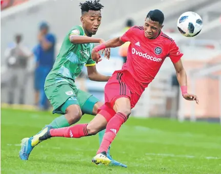  ?? Picture: Gallo Images ?? Vincent Pule, who scored Pirates’ first goal and created the second for Thembinkos­i Lorch, vies for the ball with Baroka’s Matome Mabeba during yesterday’s Absa Premiershi­p match at Peter Mokaba Stadium in Polokwane.