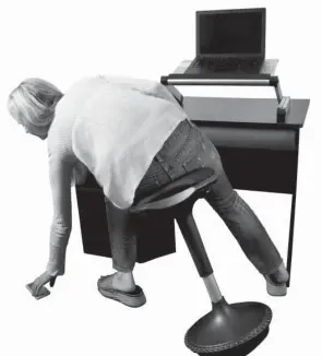  ??  ?? Set up a home workstatio­n that fosters comfort and ef  ciency. Shown here, the Wobble Stool by Uncaged Ergonomics calls muscles into play as you move.