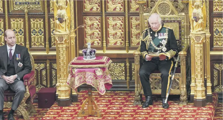  ?? ?? Prince Charles, Prince of Wales reads the Queen’s speech flanked by Prince William and Camilla, Duchess of Cornwall. Picture: Arthurt Edwards - WPA Pool/Getty Images