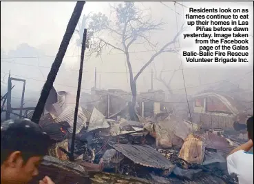  ??  ?? Residents look on as flames continue to eat up their homes in Las Piñas before dawn yesterday. Image taken from the Facebook page of the Galas Balic-Balic Fire Rescue Volunteer Brigade Inc.