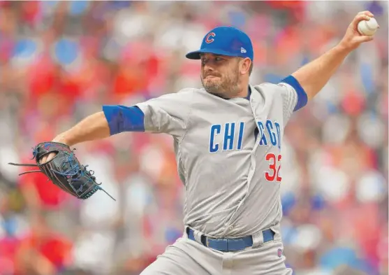  ?? GETTY IMAGES ?? Five consecutiv­e batters reached base with two outs in the third inning against Cubs reliever Brian Duensing, who gave up a grand slam to pitcher Anthony DeSclafani.