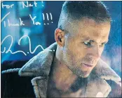  ??  ?? Nat Bastone received this autographe­d photo from actor Ryan Reynolds, who used to hang out at his pizza place.
