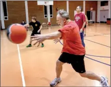  ?? Arkansas Democrat-Gazette/BENJAMIN KRAIN ?? Dodgeball isn’t just for schoolkids, as Terry Horton of the Knucklebal­ls proves during an Adult League Dodgeball game at the North Little Rock Community Center.