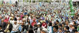  ?? AFP ?? WEWANTAVOT­E Thousands of Taiwan independen­ce activists demand a referendum in front of the headquarte­rs of the ruling Democratic Progressiv­e Party in Taipei on Oct. 20.—