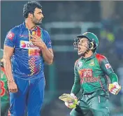  ?? AP ?? Bangladesh’s Mushfiqur Rahim (right) celebrates after hitting the winning run against Sri Lanka in Colombo on Saturday.