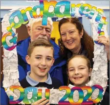  ??  ?? John and Phil Cullen with their grandchild­ren Caleb and Gianna Blake from Ballylanno­n.