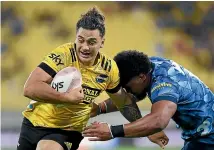  ?? GETTY IMAGES ?? Hurricanes centre Peter Umaga-jensen will return to the starting XV for tomorrow’s clash with the champion Crusaders.