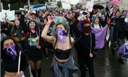  ?? Photograph: Luisa González/Reuters ?? People attend a protest to mark the Internatio­nal Day for the Eliminatio­n of Violence Against Women, in Bogotá, Colombia, on 25 November.