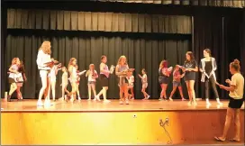  ?? Photo by Becky Polaski ?? The Elk County Catholic School System’s weeklong Summer Theater Program kicked off on Monday morning, and by the afternoon participan­ts were already rehearsing musical numbers for Friday’s production of “Annie Jr.” The show will be held in the Elk County Catholic High School auditorium at 7 p.m. and is free and open to the public.