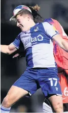  ??  ?? Rovers’ James Daly competes for a high ball with Chelsea’s Dynel Simeu