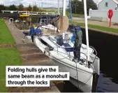  ??  ?? Folding hulls give the same beam as a monohull through the locks