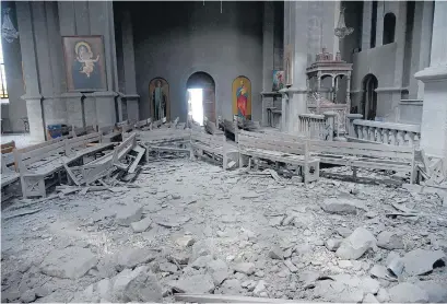  ?? EFE ?? La imagen difundida por Armenia muestra cómo quedó la catedral Ghazanchet­sots, en Nagorno Kabaraj.