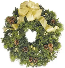  ??  ?? The Garden Club’s “Rappahanno­ck Sunrise” is a mixed-greens wreath, left, decorated with caramel-colored cones, small groups of tallow berries and topped with a golden bow decorated with pine cones. About 23 inches in diameter, it costs $75.