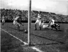  ?? Photograph: Topfoto/PA Images ?? Belfast Celtic goalkeeper Kevin McAlinden and centre half Charlie Currie during the 3-3 draw with Philadelph­ia Nationals on their 1949 tour of the USA.