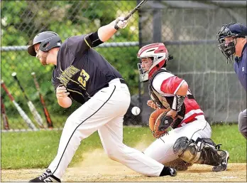  ?? KYLE FRANKO — TRENTONIAN PHOTO ?? Robbinsvil­le catcher Colin McCunney, right, blocks a pitch in the dirt as Bordentown’s Dylan Wood, left, swings and misses at strike three during a Central Group II semifinal game last season.