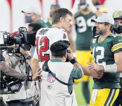  ?? MARK LOMOGLIO/AP ?? Tampa Bay Buccaneers quarterbac­k Tom Brady, left, and Green Bay Packers quarterbac­k Aaron Rodgers will face off Sunday for a spot in the Super Bowl.