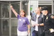  ??  ?? Protest organizer Cheryl Juaire during a protest outside Purdue’s headquarte­rs in downtown Stamford on Aug. 17.