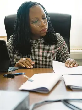  ?? SARAHBETH MANEY/THE NEW YORK TIMES ?? Judge Ketanji Brown Jackson, then President Joe Biden’s nominee to the Supreme Court, works on March 29 in her office in Washington.