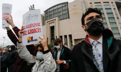  ?? Photograph: Dilara Senkaya/Reuters ?? Lawyers and supporters of the Gezi solidarity group outside court in Istanbul.