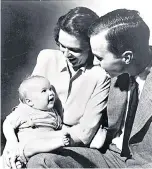  ??  ?? George and Barbara Bush with baby George W in 1947